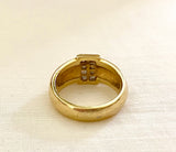 Gold Dome Ring with Sparkling Princess Cut Diamonds