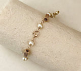 Gold and Pearl Bracelet with Clover Charm